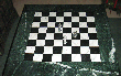 Tischplatte mit Schachbrett.gif